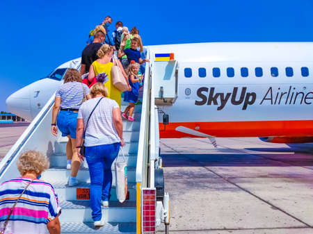 Sharm El Sheikh, Egypt - September 15, 2020: People going at SkyUp Airlines Boeing 737-800 aircraft...
