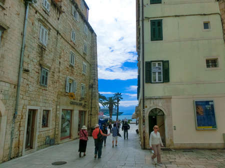 Split, Croatia - May 08, 2014: Tourists walking in the Old City on a cloudy summer day, on May 08, 2014 in Split, Croatia.のeditorial素材