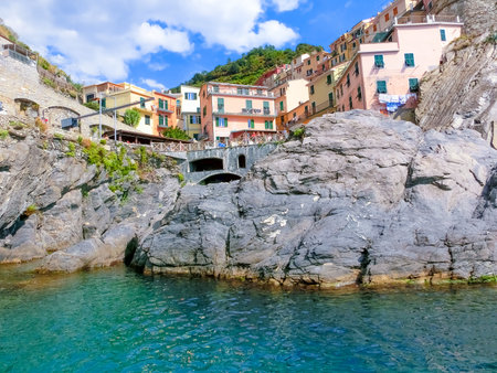 Manarola, Italy - September 09, 2015: The rock beach at Mediterranean sea at Manarola, Cinque Terre, Italyのeditorial素材
