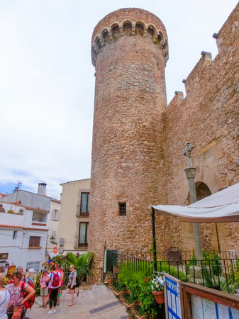 Tossa de Mar, Spain - September 14, 2015: The people going at old town Tossa de Mar in Costa Brava, Catalonia, Spain on September 14, 2015のeditorial素材