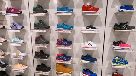 Kyiv, Ukraine - August 16, 2020: Adidas superstar white and black shoes and Nike sneakers at popular fashion store EpiCentre at Kyiv, Ukraine on August 16, 2020.のeditorial素材