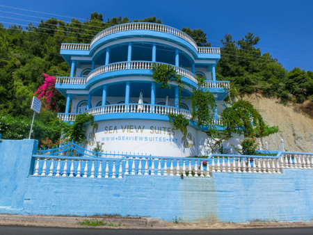 Katakolon, Greece - June 11, 2015: Apartment or hotel Sea view Suites in the port of Katakolon, Greece on June 11, 2015. It is the gateway to Olympia, Greece.のeditorial素材