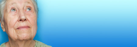 Cataract concept. Senior woman's eye, closeup and cataracts and healthy eye conceptの写真素材