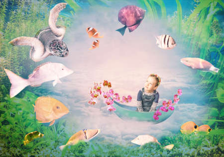 Make my wishes. Mixed media. Creative art collage about childhood and dream concept. Underwater world and coral fish. Conceptual image about beautiful girl floating in a boat among the cloudsの写真素材