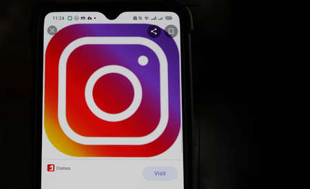 Kyiv, Ukraine - April 18, 2021: Smartphone showing the instagram application alongside other...