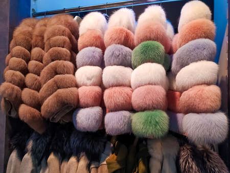 The womans many color winter fur clothes in fashion shop at Turkey