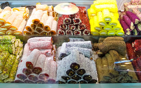 Variety of Turkish traditional lokum from Pomegranate juice. Middle East typical dessert and Turkish delightの写真素材