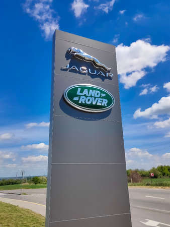 Kyiv, Ukraine - May 8, 2021: Land Rover logo on a store. Land Rover is a car brand that specialises in four-wheel-drive vehicles, owned by British multinational car manufacturer Jaguar Land Roverのeditorial素材