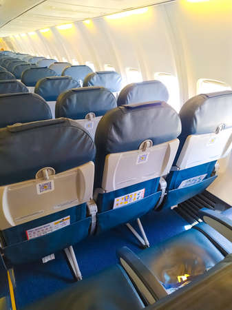 Antalya, Turkey - May 11, 2021: The interior of passenger airplane with the seats and screensのeditorial素材