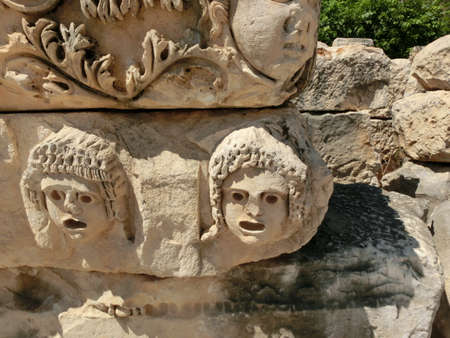 Masks and rock tombs in Myra, Turkey. Ancient tomb by Lycia in Fethiye, archeology and travel conceptの写真素材