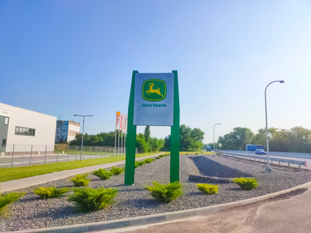 Nikolaev, Ukraine - June 16, 2021: John Deere logo at store at road at Nikolaev, Ukraine on June 16, 2021のeditorial素材