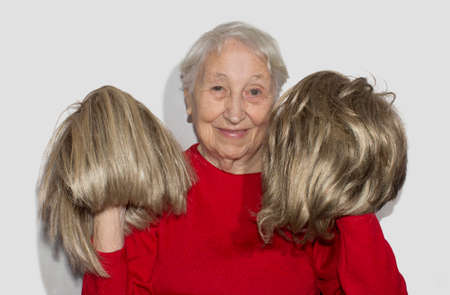 Senior woman with a wig hair, beauty details, hair concept