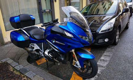Colmar, Alsace, France - December 30, 2021: BMW Motorrad r1200rt motorcycle on parked in street near...