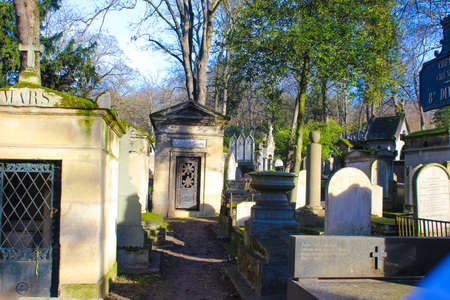 Paris, France - January 01, 2022: Graves and crypts in Pere Lachaise Cemetery, This cemetery is the...