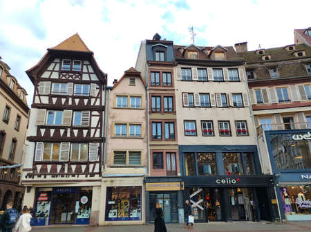 Strasbourg, Alsace, France - December 30, 2021: People going at Place Kleber, central square of Strasbourg, surrounded by numerous palaces, important buildings and statue of Kleberのeditorial素材