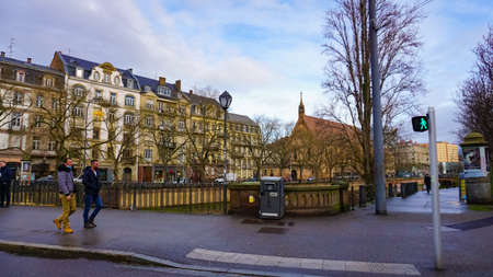 Strasbourg, Alsace, France - December 30, 2021: People going to downtown area of Strasbourg at...