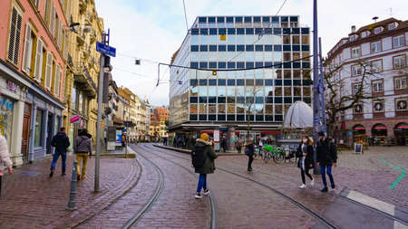 Strasbourg, Alsace, France - December 30, 2021: People going at central of Strasbourg at Alsace,...