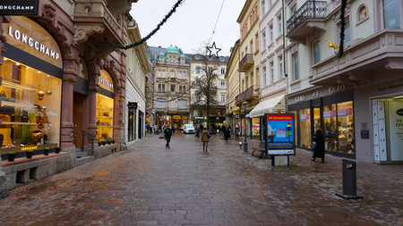 Baden-Baden, Germany - December 29, 2021: People going near historic buildings at the famous old town of Baden-Badenのeditorial素材