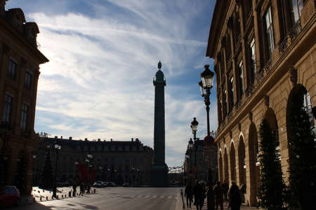 Paris, France - January 01, 2022: People going near Place Vendome, wich was laid out in 1702. The original Vendome Column at the center of the square was erected by Napoleon I.のeditorial素材
