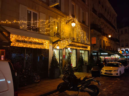 Paris, France - January 01, 2022: The French traditional restaurant Le Soufflot located in Latin quarter at rainy night, Paris, France.のeditorial素材