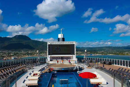 Miami, USA - April 29, 2022: Outdoor Pool and upper desk in the at new cruise ship or new flagship...