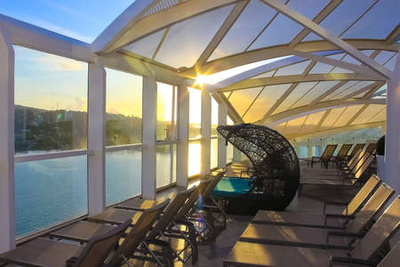 Miami, USA - April 29, 2022: Solarium with pools, bars at Symphony of the seas is the biggest cruise ship at Miami, USA on April 29, 2022のeditorial素材