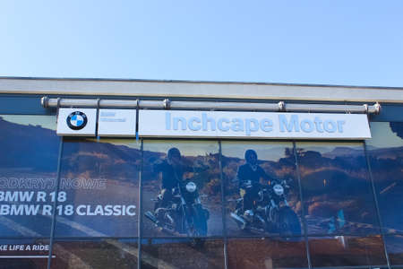 Wroclaw, Poland - April 18, 2022: BMW Inchcape Motor car dealership with cars parked on forecourt.のeditorial素材