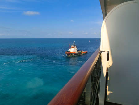 Puerto Plata, DR - January 10, 2022: Patrol boat sailing in bright blue Caribbean waterのeditorial素材