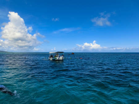 Roatan, Honduras - April 26, 2022: The people at snorkeling underwater and fishing tour by boat at the Caribbean Sea at Roatan, Hondurasのeditorial素材