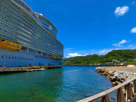Roatan, Honduras - May 02, 2022: Symphony of the seas is the biggest cruise ship, docked in Roatan, Hondurasのeditorial素材