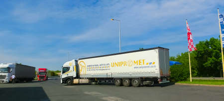 D-1 Truckpark, Czech - May 10, 2022: Trucks and Semi Trailer Trucks the Parking lot. Delivery...