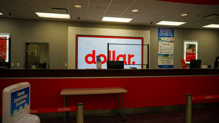 Miami, Florida, USA - November 29, 2019: The people near Dollar rental car office at Miami airport at Miami, Florida, USAのeditorial素材