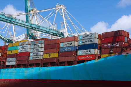 Miami, USA - April 29, 2022: Maersk container ship at Port Miami, one of the largest cargo ports in the US.のeditorial素材