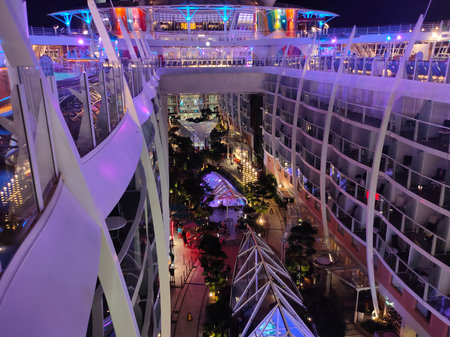 Miami, USA - April 29, 2022: The central park at cruise liner or ship Symphony of the Seas by Royal...
