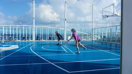 Miami, USA - April 29, 2022: The people playing at upper deck with mini basketball court at cruise liner or ship Symphony of the Seas by Royal Caribbeanのeditorial素材