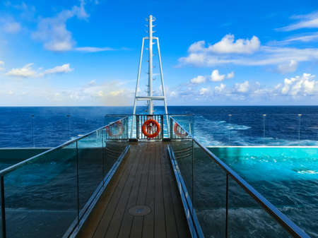 Miami, USA - May 4, 2022: The quiet adult swimming pool area at new cruise ship or new flagship of...