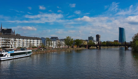 Frankfurt am Main, Germany - April 20, 2022: Ship on Main River in Frankfurt urban areaのeditorial素材