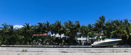 Fort Lauderdale, Florida, US - May 08, 2022: Typical apartment, buildings with the road in the foreground at Fort Lauderdale.のeditorial素材