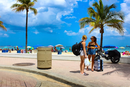 Fort Lauderdale, Florida, US - May 08, 2022: Fort Lauderdale beach near Las Olas Boulevard with the road in the foreground.のeditorial素材