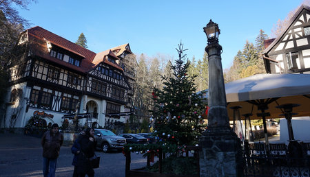 Sinaia, Romania - December 31, 2022: Carol Gastro Bierhaus restaurant next to Peles Castle in the Carpathian Mountains, Prahova Countyのeditorial素材