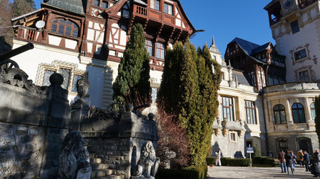 Sinaia, Romania - December 31, 2022: People going near Peles castle Sinaia in winter season, Transylvania, Romania protected by Unesco World Heritage Siteのeditorial素材