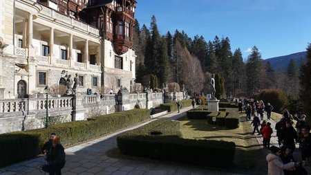 Sinaia, Romania - December 31, 2022: People going near Peles castle Sinaia in winter season, Transylvania, Romania protected by Unesco World Heritage Siteのeditorial素材