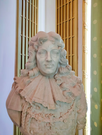 Sinaia, Romania - December 31, 2022: The interior of the Peles castle in Sinaia, in Romania - statue or sculpture or bust of King Louis XIVのeditorial素材