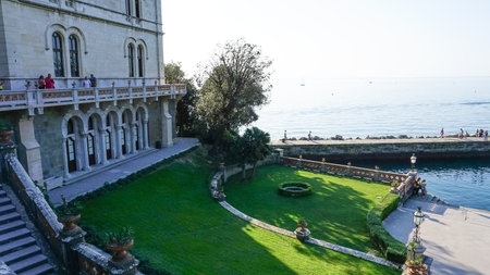 Trieste, Italy - October 1, 2023: Tourists going at Miramare Castle Garden on a sunny day at Trieste, Italyのeditorial素材
