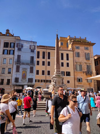 Rome, Italy - October 3, 2023: People going near the fountain of four rivers on the area of Navona in Rome at Italyのeditorial素材