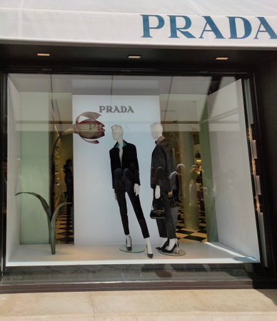 Venice, Italy - October 5, 2023: Logo of Prada an Italian luxury fashion house that was founded in...