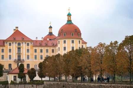 Moritzburg, Germany - October 20, 2023: People going near Moritzburg Castle. It is located near Dresden in the Saxon village of Moritzburg. The popular fairy tale Three Nuts for Cinderella was filmed at Moritzburg Castle.のeditorial素材
