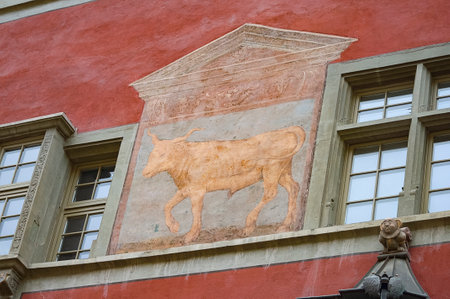 Schaffhausen, Switzerland - October 21, 2023: Beautiful facade of historic house at the old town of Swiss City of Schaffhausen on a foggy day at Schaffhausen, Switzerland on October 21, 2023のeditorial素材