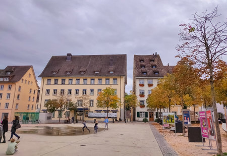 Schaffhausen, Switzerland - October 21, 2023: People going at the old town of Swiss City of Schaffhausen on a foggy day at Schaffhausen, Switzerland on October 21, 2023のeditorial素材