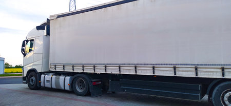 Trucks at parking lot. Delivery cars. Cargo shipping. Lorry. Industry, Freight Truck, Logistics transport Concept.の写真素材